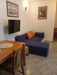 TV a/nebo společenská místnost v ubytování Apartman Mare