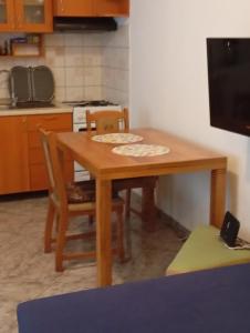Kuchyň nebo kuchyňský kout v ubytování Apartman Mare + 7 fotografií