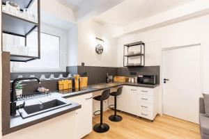 Kuchyňa alebo kuchynka v ubytovaní Calm Center Modern Apartment