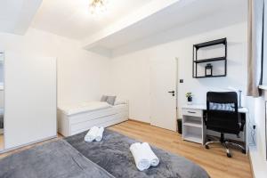 Posteľ alebo postele v izbe v ubytovaní Calm Center Modern Apartment