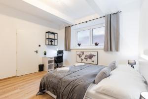 Posteľ alebo postele v izbe v ubytovaní Calm Center Modern Apartment