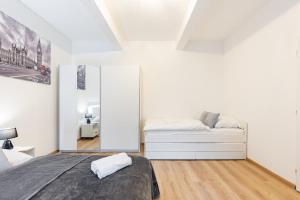 Posedenie v ubytovaní Calm Center Modern Apartment