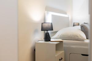 Posteľ alebo postele v izbe v ubytovaní Calm Center Modern Apartment