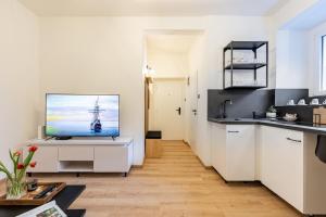 Kuchyňa alebo kuchynka v ubytovaní Calm Center Modern Apartment