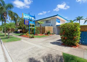 a motel sign in front of a house at Raceways Motel in Brisbane