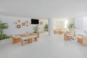 Meraki Resort Sharm El Sheikh Adults only的电视和/或娱乐中心
