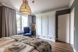 Postel nebo postele na pokoji v ubytování Ferienwohnung Hus up Höcht + 9 fotografií