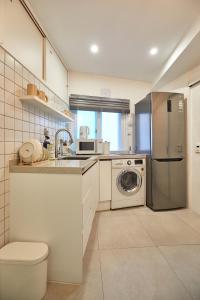 Kuchyň nebo kuchyňský kout v ubytování Jongnorang + 16 fotografií