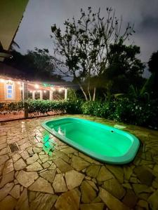 Πισίνα στο ή κοντά στο Chácara com piscina