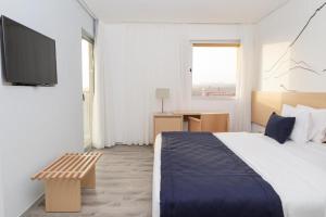 Postel nebo postele na pokoji v ubytování Hotel Happy Day