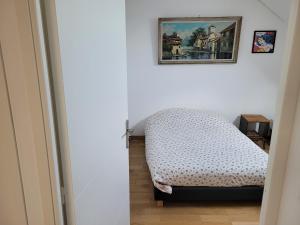 Postel nebo postele na pokoji v ubytování Maison chaleureuse dans un ancien corps de ferme