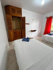 Postel nebo postele na pokoji v ubytování Hostal Neptuno - Poseidon