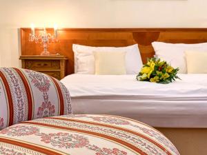 Postel nebo postele na pokoji v ubytování Hotel Štekl