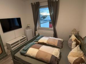 a hospital room with two beds and a window at Apart-Hotel Rheinischer Hof Dormagen in Dormagen +96 photos