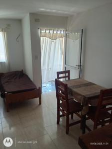 Postel nebo postele na pokoji v ubytování Departamento Mar de Ajo