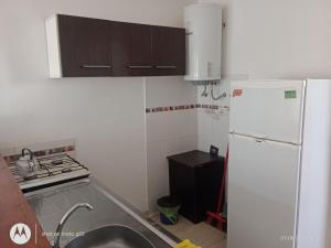 Kuchyň nebo kuchyňský kout v ubytování Departamento Mar de Ajo