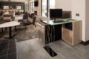 a office with a desk with a computer on it at Residence Inn by Marriott Tulsa Downtown in Tulsa