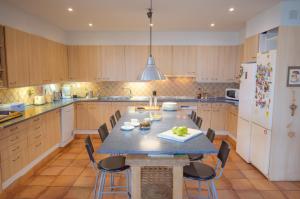 A kitchen or kitchenette at L'Albaida, tranquility, views of sea and mountains