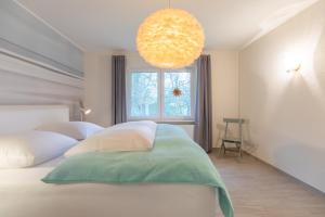 Ένα ή περισσότερα κρεβάτια σε δωμάτιο στο Noordhuus