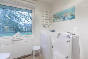 Ένα μπάνιο στο Noordhuus +26 φωτογραφίες