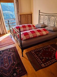Postel nebo postele na pokoji v ubytování Chalet Catton Four bedroom appartement near Bad Kleinkirchheim