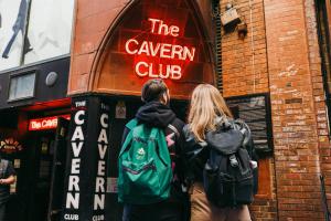 two people walking in front of a cavern club at EPIC Duke Street Townhouse in Liverpool