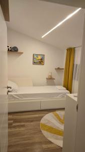 Postel nebo postele na pokoji v ubytování Morava 1 Asparuhovo Beach Holiday Home Apatment