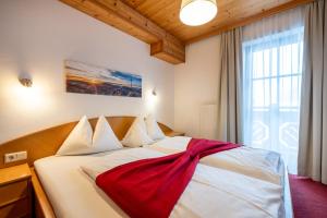 Posteľ alebo postele v izbe v ubytovaní Aparthotel Dachsteinblick