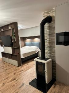 En eller flere senge i et værelse på Luxusne apartmany z tarasami - Isabel