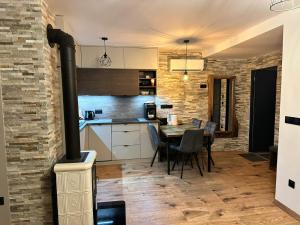 Køkken eller tekøkken på Luxusne apartmany z tarasami - Isabel