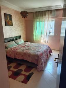 Ένα ή περισσότερα κρεβάτια σε δωμάτιο στο إقامة سامية