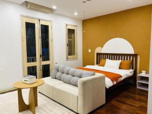 Postel nebo postele na pokoji v ubytování Didou Homestay Đông Anh