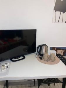 TV a/nebo společenská místnost v ubytování Lupen III