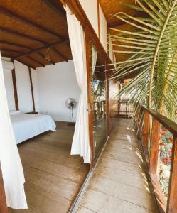 Un ou plusieurs lits dans un hébergement de l'établissement Teulu Máncora 24 autres photos