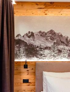 Postel nebo postele na pokoji v ubytování Dolomites Room and Breakfast Formiè