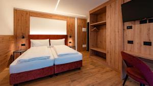 Postel nebo postele na pokoji v ubytování Dolomites Room and Breakfast Formiè