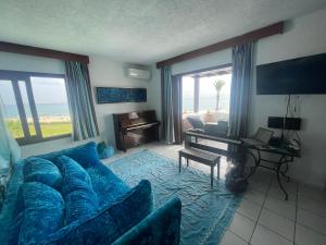 Χώρος καθιστικού στο Villa Eden Park sur la plage