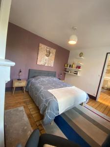 Postel nebo postele na pokoji v ubytování Au logis de Abi