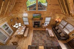 an overhead view of a living room in a log cabin at Mountain Paws #526 in Sevierville