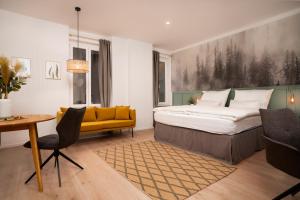 Voodi või voodid majutusasutuse Hirschenhof Apartments toas