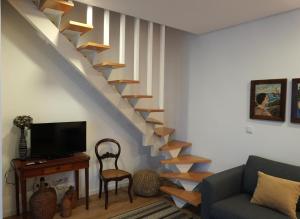 Et tv og/eller underholdning på Casa do Lado - Vila Franca do Campo - AL