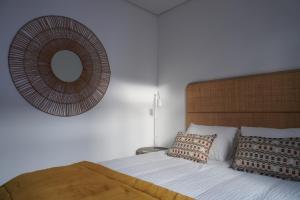 En eller flere senge i et værelse på Casa do Lado - Vila Franca do Campo - AL