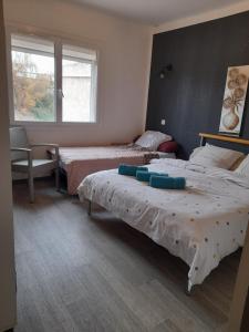 Postel nebo postele na pokoji v ubytování Hotel Restaurant Calypso