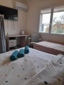 Postel nebo postele na pokoji v ubytování Hotel Restaurant Calypso