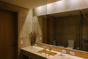 Um banheiro em Plaza Paradiso Petit Hotel
