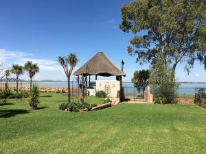 a gazebo with a view of the water at Danica's in Denysville