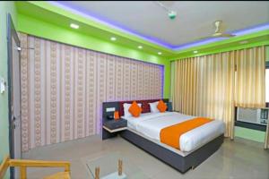 Postel nebo postele na pokoji v ubytování Hotel Opulence Kalinga