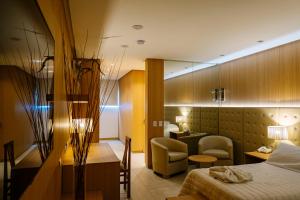 Cama ou camas em um quarto em Plaza Paradiso Petit Hotel