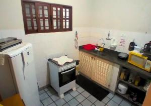 Η κουζίνα ή μικρή κουζίνα στο Hostel Água Verde