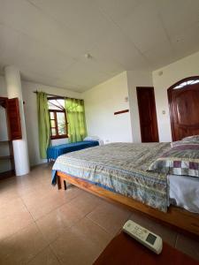 Postel nebo postele na pokoji v ubytování Hostal Neptuno - Poseidon